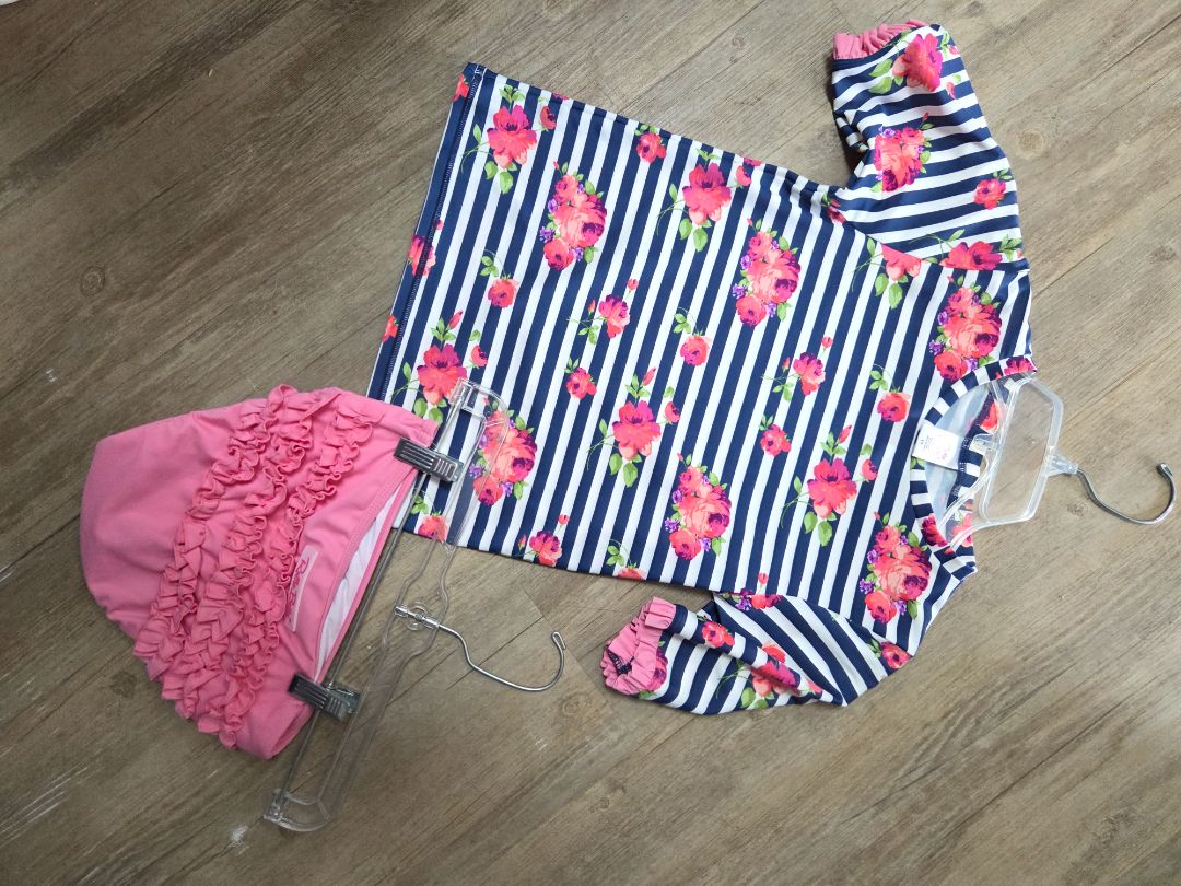 pink/navy ruffle butts floral stripe swim suit, girl 10
