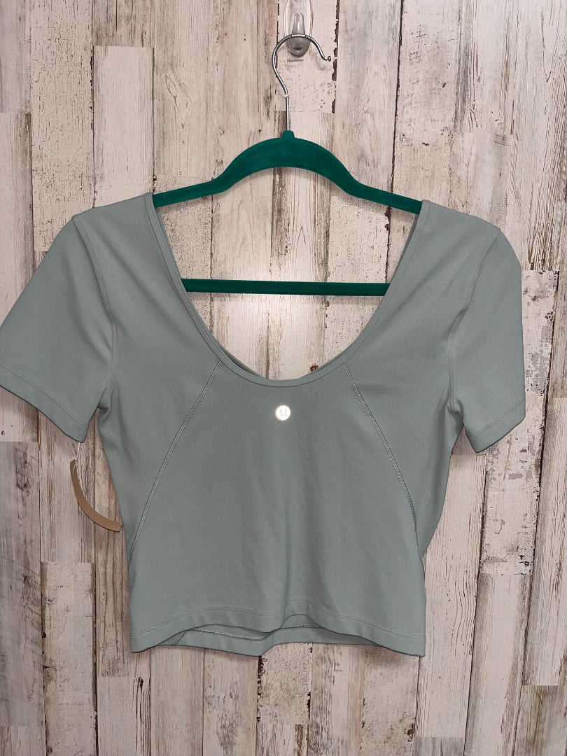SAGE LULULEMON SZ 6 V NECK CROP TEE, LADIES M