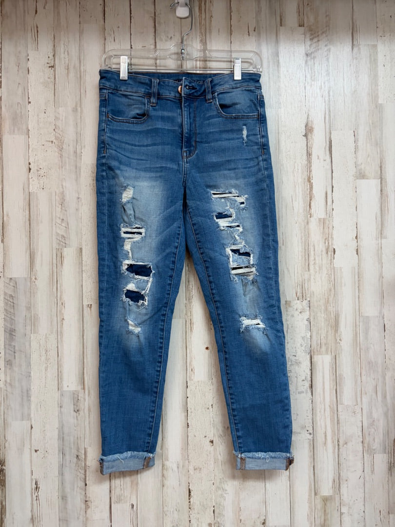 DENIM AMERICAN EAGLE SZ8 DISTRESS SKINNIES, LADIES M