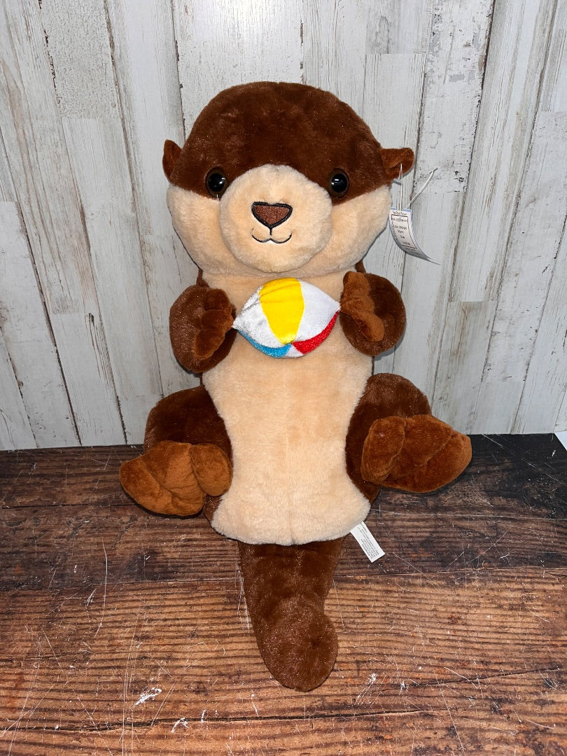 BROWN STUFFED OTTER TOY
