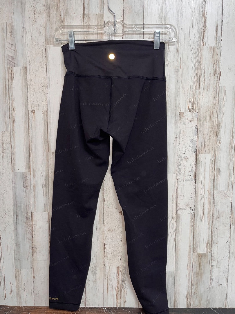 BLACK LULULEMON SZ 6 LOGO SCRIPT LEGGINGS, LADIES M
