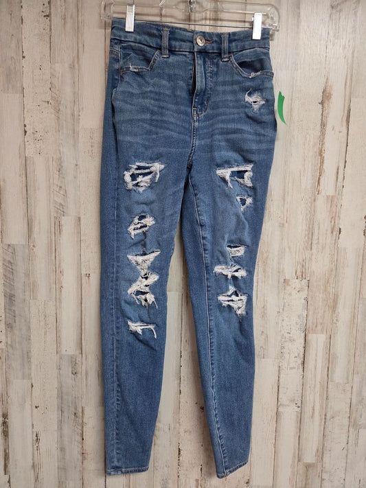 DENIM AMERICAN EAGLE SZ0 DISTRESS JEANS, LADIES XS