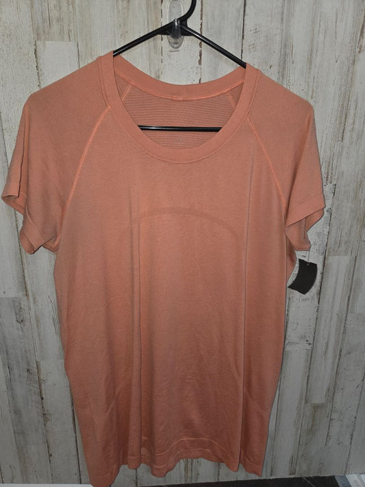 PEACH LULULEMON SZ10 LOGO TOP, LADIES L