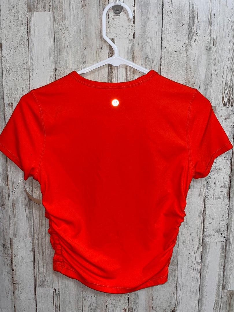 CORAL LULULEMON SZ 6 CINCH SIDE DRY FIT TEE, LADIES M