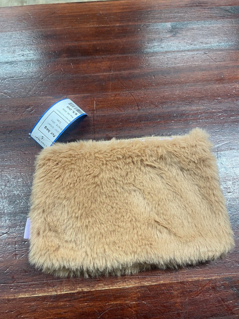 brown ipsy fur bag