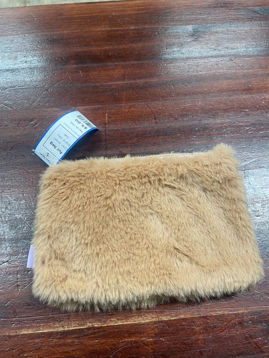 brown ipsy fur bag