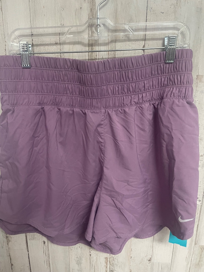BLUE NIKE ATHLETIC SHORTS, LADIES XL