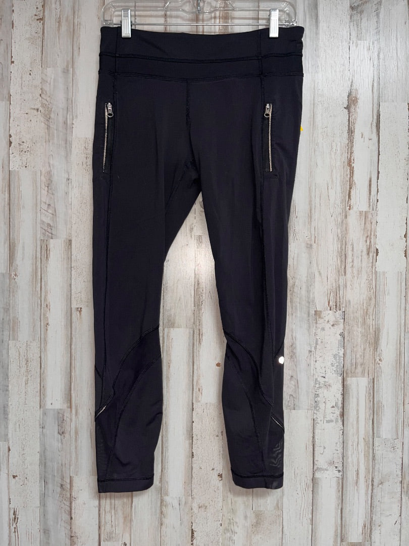 BLACK LULULEMON MESH BOTTOM ZIP POCKET LEGGINGS  SZ 8, LADIES M