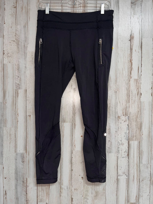 BLACK LULULEMON MESH BOTTOM ZIP POCKET LEGGINGS  SZ 8, LADIES M