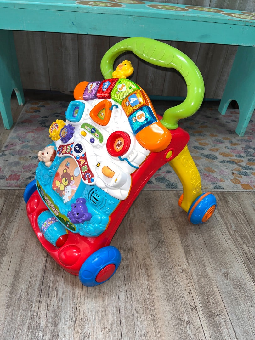 RED VTECH STROLL AND DISCOVER WALKER- NEEDS BATTERIES, TOYS